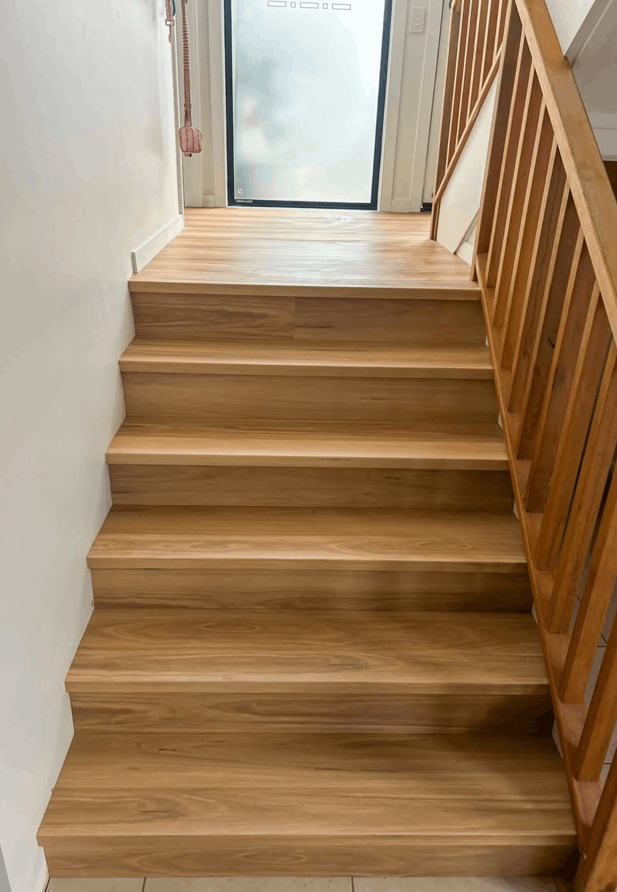 Hybrid timber staircase installed over old carpet in a Brisbane home